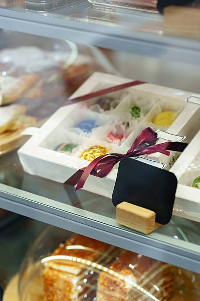 istock Colorful dessert box displayed in a cafe showcasing various sweets and treats 2248321728