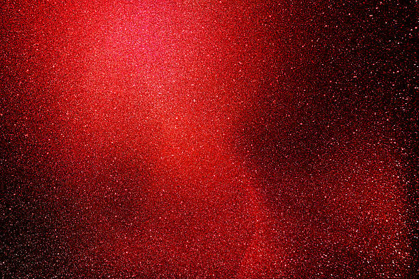 istock Red glitter paper texture background with space. glitter star effect just like space. night sky universe rusty texture rough grain. 2248322302