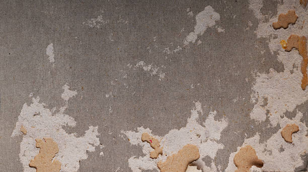 istock Textured cardboard background with subtle color gradient and scratches. 2248326435