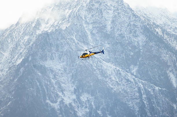 A rescue helicopter in a mountain area