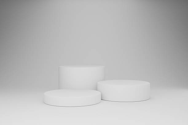 istock The white cylindrical objects are resting on the gray background 2248330237