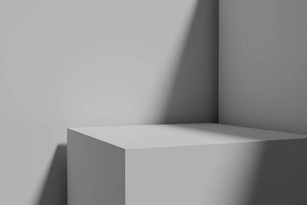 istock The light gray cube is positioned in the corner, highlighted by a strong shadow 2248330596