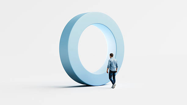 istock Man approaching a giant circular gateway that represents breakthrough, new direction, personal growth and stepping into the next phase, 3d render 2248331243