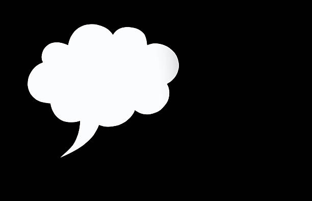 Speech bubble in the form of a cloud on a black background. Free space for text. Empty white speech bubble with text writing option. The concept of speech communication on the Internet