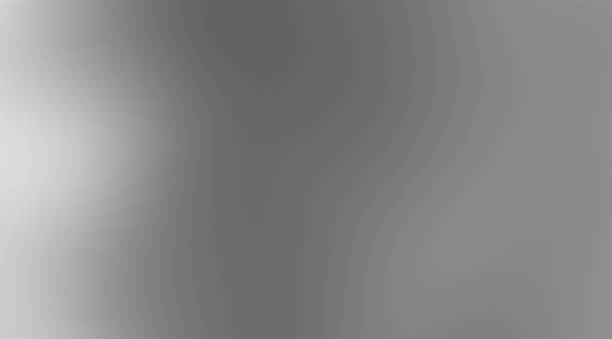istock Blurred gradient silver gray matte steel aluminum foil texture smooth abstract blurry monochrome background 2248339398