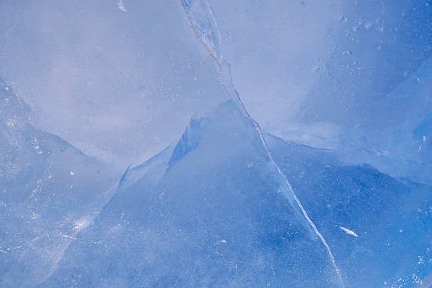 istock Texture of winter ice surface. Blue natural ice background 2248340067