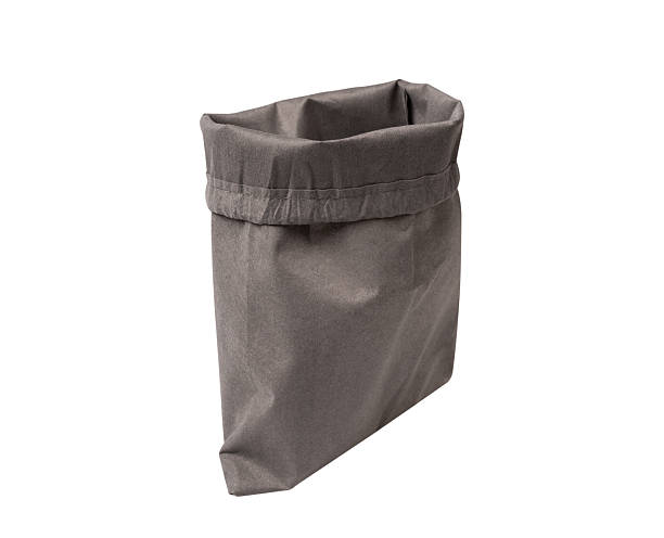 istock A grey eco-friendly fabric drawstring bag, isolated on a white background. Ideal for concepts related to sustainability, fitness, travel, and branding mockups. 2248340856