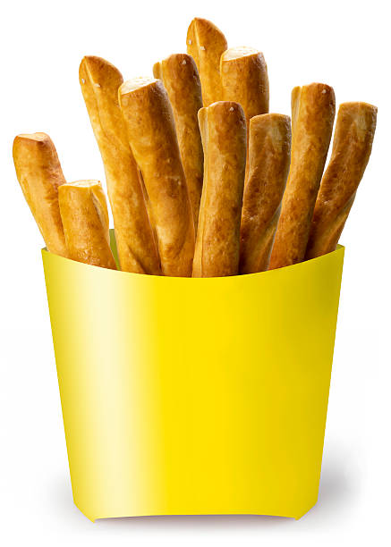 Baked bread stick in paper bucket isolated on white background, Pretzel baked bread on white With clipping path.