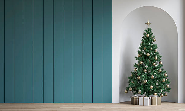istock Modern minimalist unfurnished interior decorated for Christmas, with an accent empty teal blue shiplap wall and copy space, Christmas tree with presents in a wall niche, near a window 2248342806