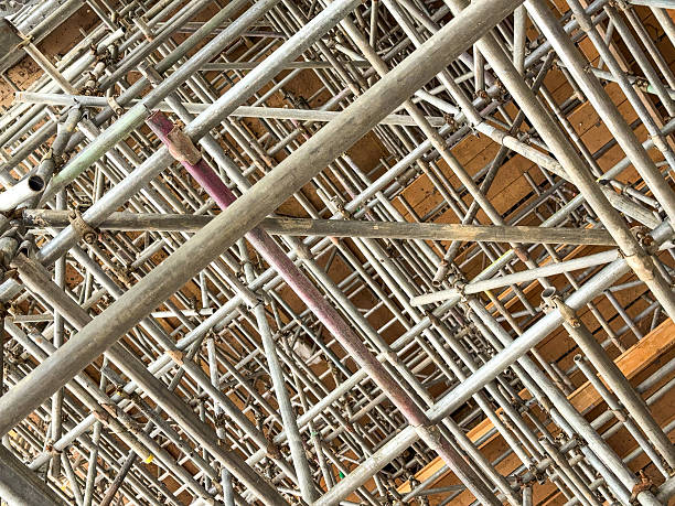 istock Network of scaffolding poles inside a building for refurbishment 2248342928