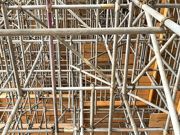 istock Network of scaffolding poles inside a building for refurbishment 2248342932