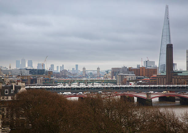 Rotherhithe, London, September 20, 2023 - Canary Wharf: Major business district in East London, England - Rotherhithe Panoramic view of Limehouse, London (a regenerated former dockland area where housing in converted warehouses and modern towers lines the Thames and Limehouse Basin).