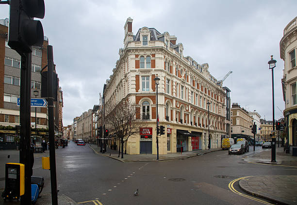 A Typical Historic building facade on a intersection of Garrick Street, Covent Garden, City of London, England.
