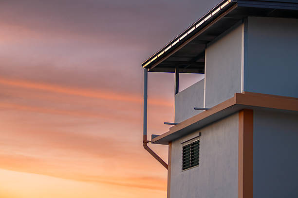 istock Modern Architecture Silhouette Against Fiery Sunset Sk 2248345828