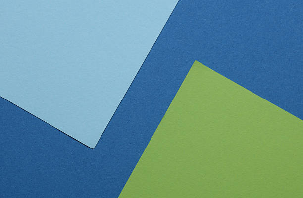 istock Creative background layout with colored sheets of paper in blue and green tones 2248348111