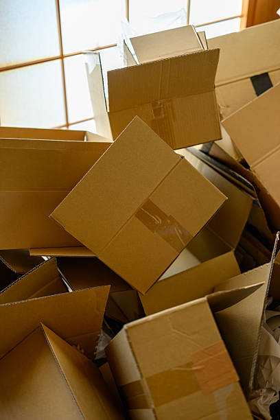 istock Pile of Empty Cardboard Boxes After Unpacking or Delivery 2248348646