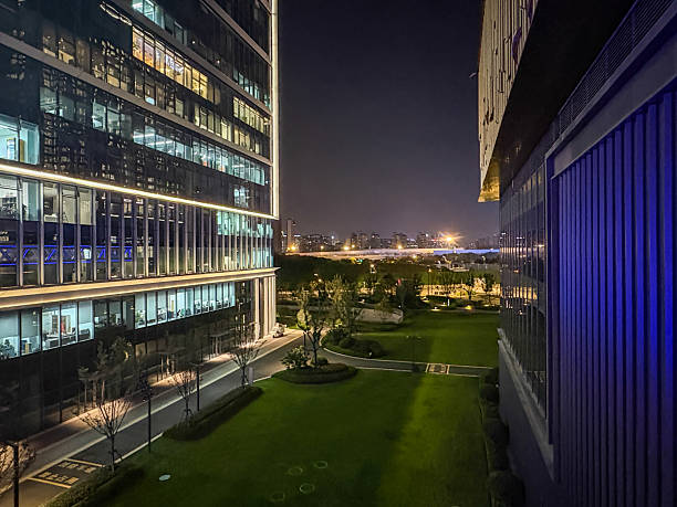 istock City office buildings decorated with neon lights at night 2248349832