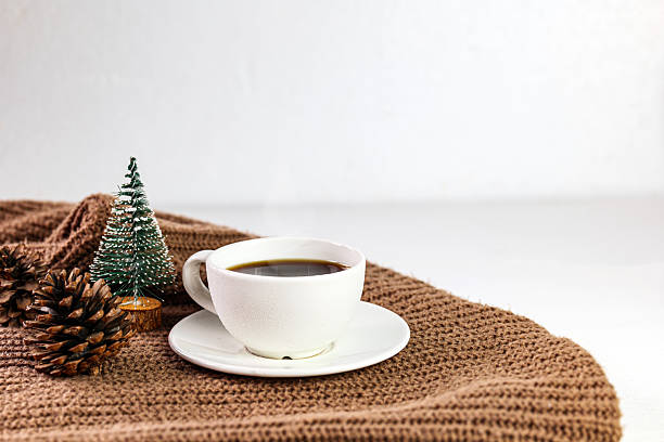 istock Cozy winter Coffee with pine cones and Chistmas tree decorationv 2248351711