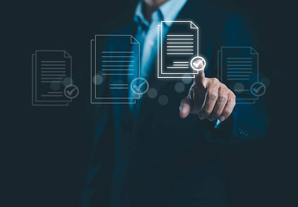 istock A business professional selecting a digital document with a glowing check mark, symbolizing approval, verification, secure workflow management, and efficient digital processes in modern corporate. 2248355811