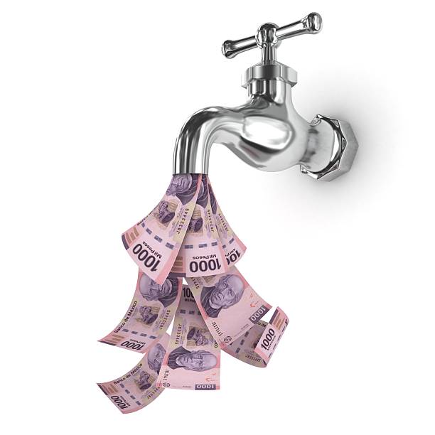 istock Mexican money peso falling finance crisis 2248357490