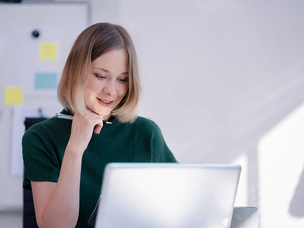 istock Learning online working concept. woman working on tablet and laptop computer, searching working in office. 2248360913