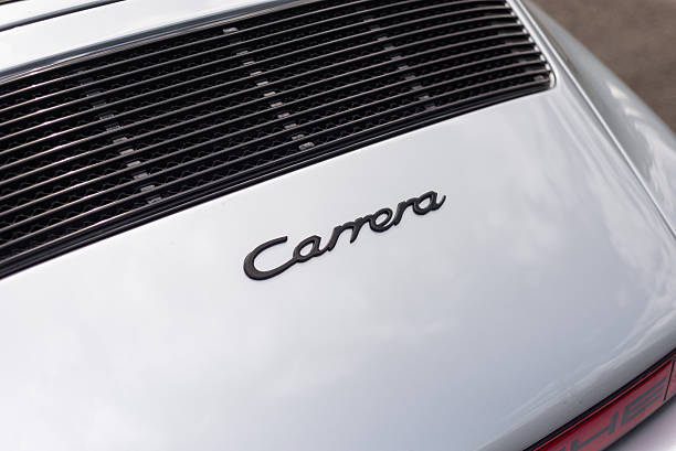 Vilnius, Lithuania - June 20, 2024: Classic Porsche 911SC (G-model) parked at the side of the road. After full restoration, painted in smart silver colour, with period correct RUF wheels. Carrera badge visible.