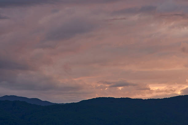 The last, intense golden light before the landscape surrenders completely to the cool shadows of night.