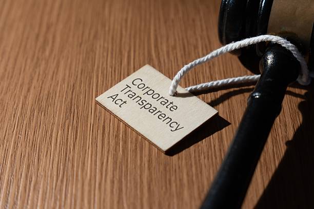 istock A wooden gavel next to a tag labeled Corporate Transparency Act. 2248369519