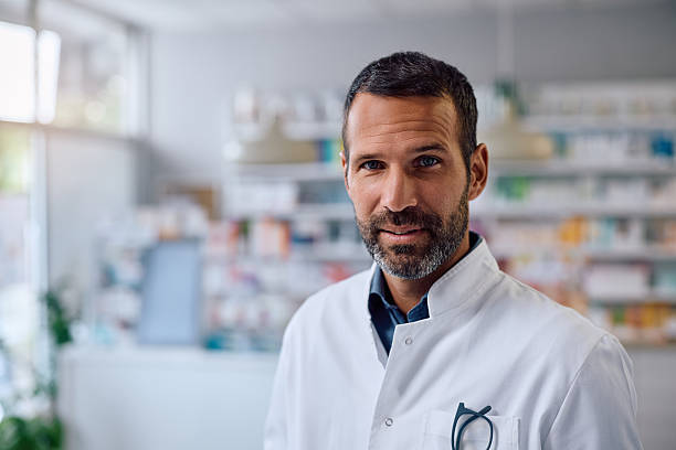 istock Portrait of smiling pharmacist looking at camera. 2248371456