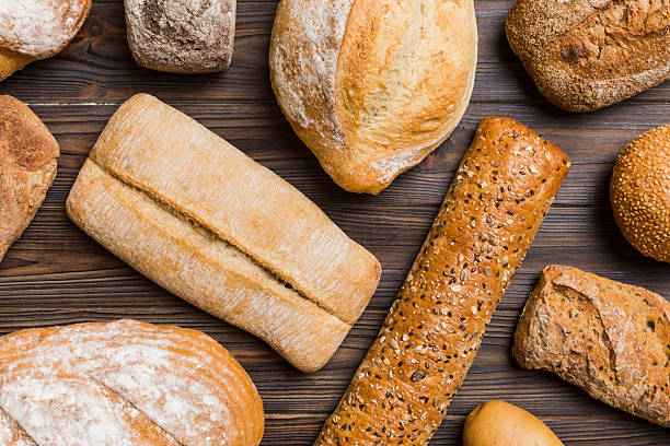 istock Homemade natural breads. Different kinds of fresh bread as background, top view with copy space 2248380968