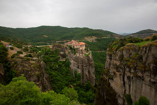 Unesco world heritage site meteora monastery standing on towering rock formations in greece, a unesco world heritage site and cultural landmark. Meteora, greece