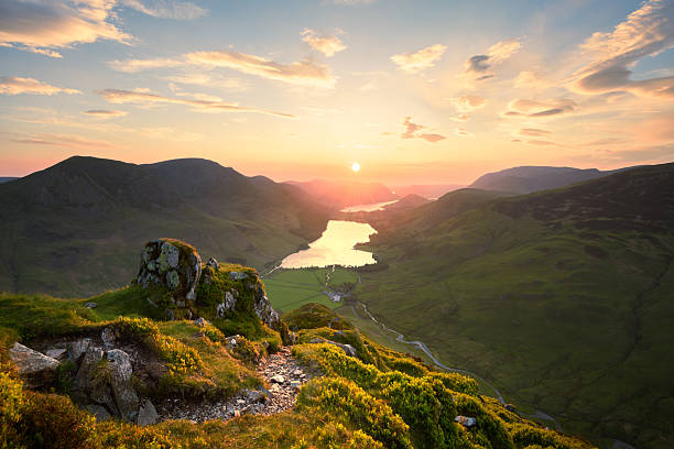 istock Lake District mountains at sunset overlooking Buttermere and Crummock Water, UK. 2248382595
