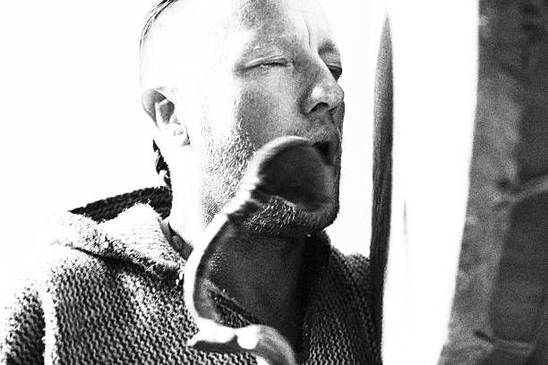 A high-contrast ritual portrait suspended between sound, ecstasy, and inner invocation.