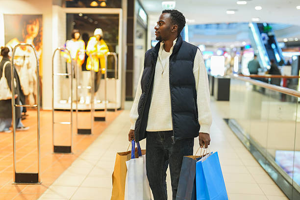 istock African American Man Shopping at Modern Mall 2248383894