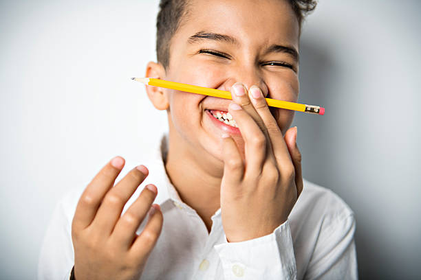 A cute Asian little boy laughed happily