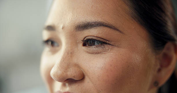 istock Eye care, optometry and woman with thinking for ideas, memory or reflection with wellness. Optical health, ophthalmology and face of female person with planning, hope or vision with eyesight. 2248392619
