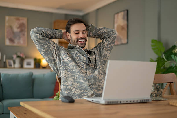 istock Veteran man relaxing at home using laptop 2248394548