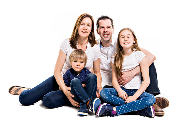 istock Happy family with two kids on studio white background 2248395354