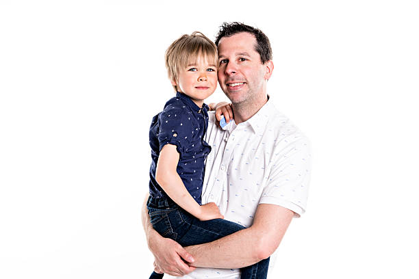istock A Father and his five years blond son together isolated on white 2248395397
