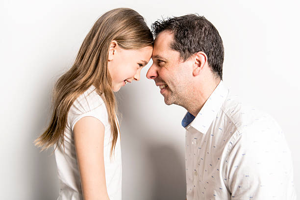 istock A Girl with his father, isolated on white background 2248395419