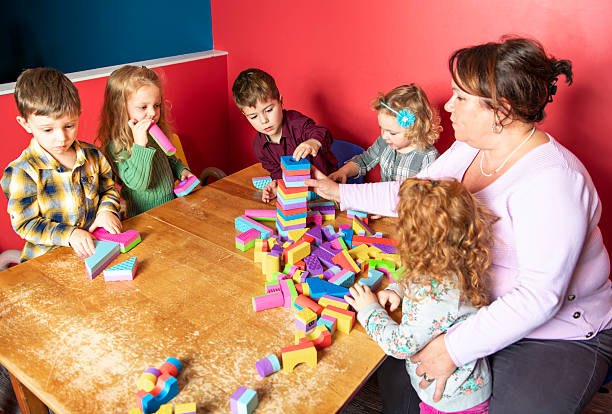 istock The cute preschoolers group in kindergarten together 2248398270