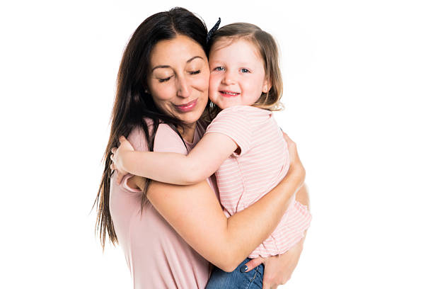 istock pretty mother standing with her cute daughter 2248400546