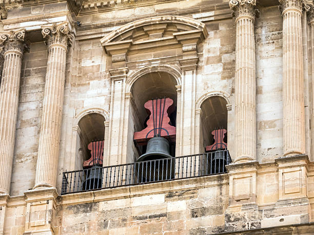 Three bells on the bell tower of Malaga Cathedral, Andalusia, Spain: