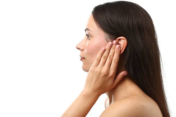 istock Sound. Woman touching her ear on white background 2248407106