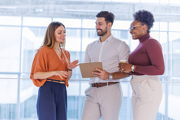 istock Business colleagues collaborating together in modern office environment 2248407888