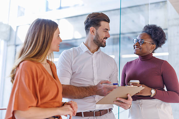 istock Business team collaborating smiling during informal office meeting 2248407933