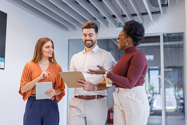 istock Diverse business people discussing during office collaboration 2248407960