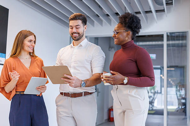 istock Diverse business team collaborating and discussing in modern office 2248407969