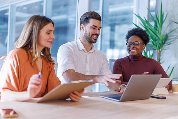 istock Diverse business people collaborating in modern office meeting 2248407989