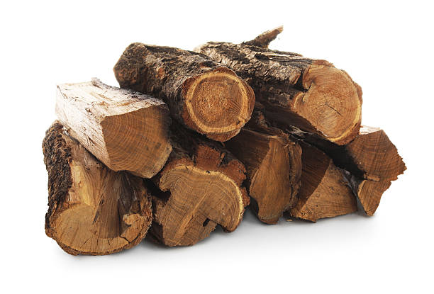 istock Pile of cut firewood isolated on white 2248411318